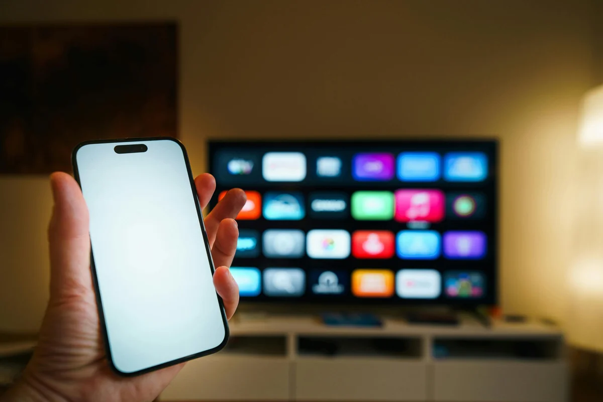 Android TV streaming IPTV channels on a large smart TV in a modern living room