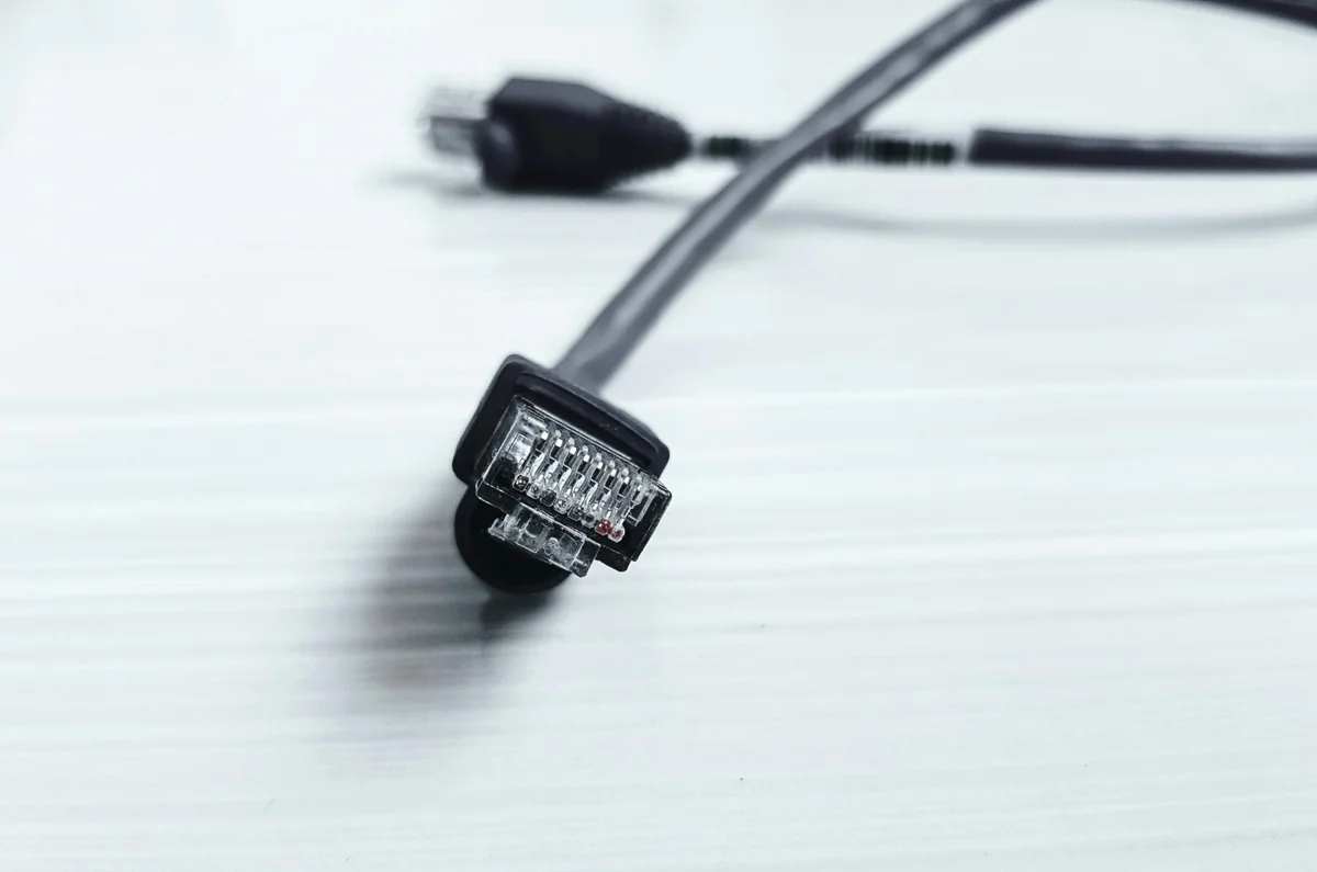 Ethernet cable connected to router for stable wired IPTV internet connection