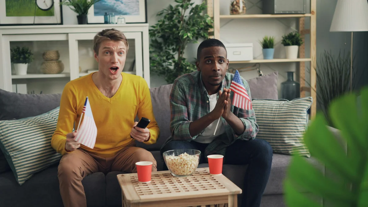 American sports fan watching NFL and NBA on IPTV service with live sports channels